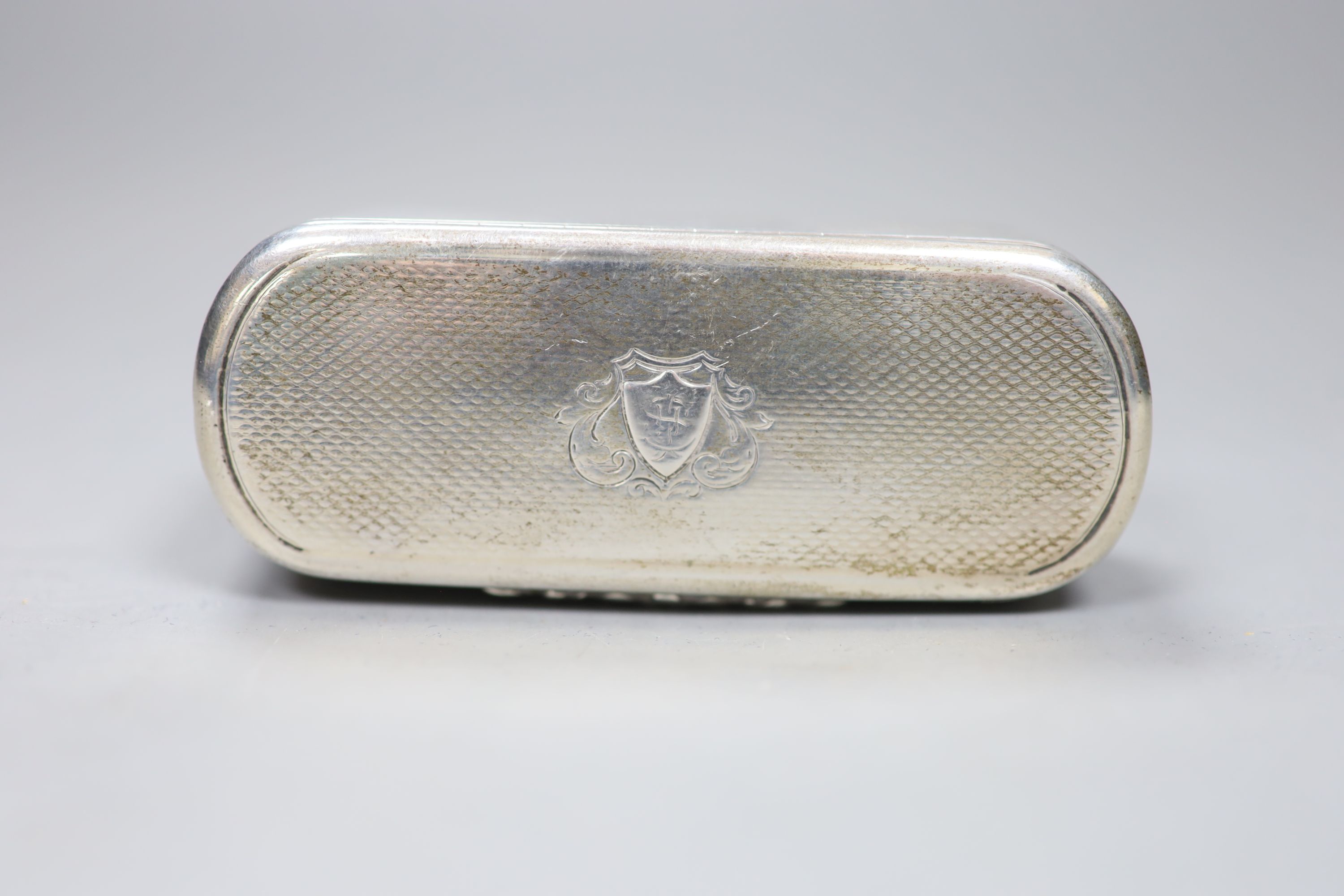 A Victorian engine turned silver oval snuff box, Edward Smith, Birmingham, 1856, 92mm, 113 grams.